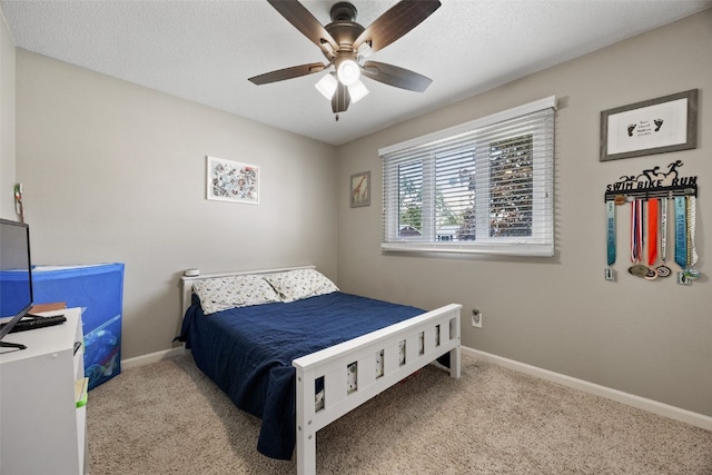 2985 4th St, Marion, IA 52302 - bedroom featuring baseboards, carpet, and a ceiling fan