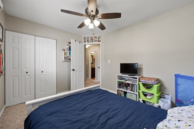 2985 4th St, Marion, IA 52302 - bedroom featuring baseboards, carpet floors, a closet, and ceiling fan