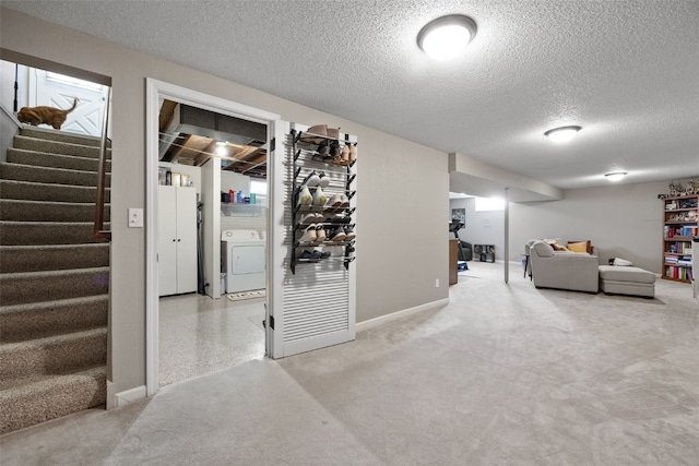2985 4th St, Marion, IA 52302 - finished basement featuring washer / dryer, stairway, a textured ceiling, and baseboards