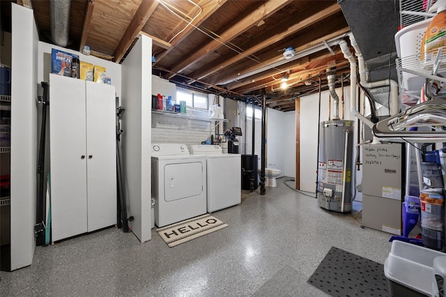 2985 4th St, Marion, IA 52302 - below grade area featuring gas water heater and washer and dryer