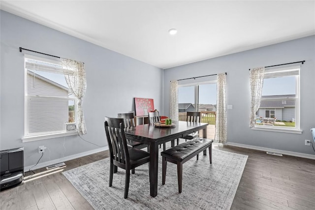 2890 Meadow Ct, Hiawatha, IA 52233 - dining area featuring wood finished floors and baseboards