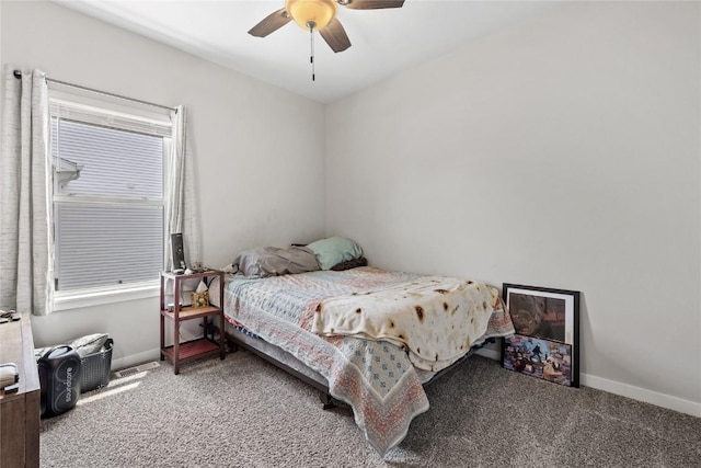2890 Meadow Ct, Hiawatha, IA 52233 - bedroom with carpet flooring, baseboards, and ceiling fan