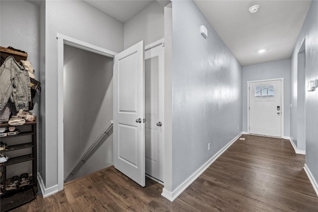 2890 Meadow Ct, Hiawatha, IA 52233 - hall with dark wood-type flooring and baseboards