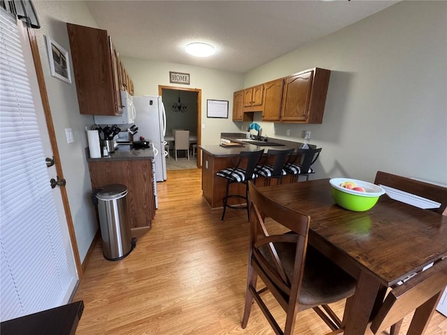 4610 Westchester Dr NE Unit A, Cedar Rapids, IA 52402 - dining room with light wood-type flooring