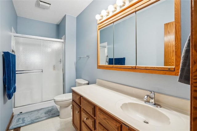 4610 Westchester Dr NE Unit A, Cedar Rapids, IA 52402 - full bathroom featuring a stall shower, vanity, and toilet
