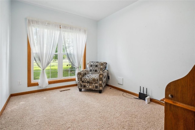 4610 Westchester Dr NE Unit A, Cedar Rapids, IA 52402 - living area with carpet and baseboards