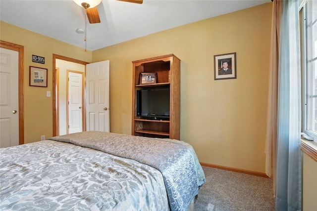 7025 Walden Rd NE, Cedar Rapids, IA 52402 - carpeted bedroom featuring baseboards and ceiling fan