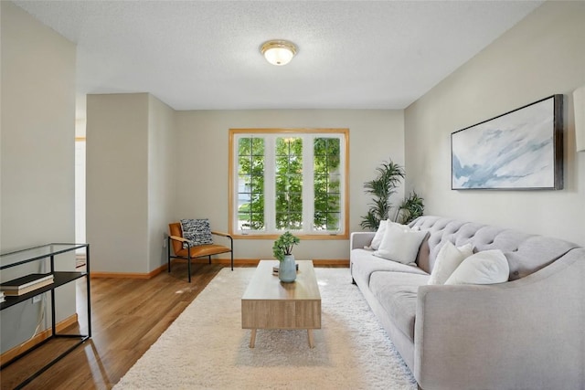 7025 Walden Rd NE, Cedar Rapids, IA 52402 - living room with wood finished floors and baseboards