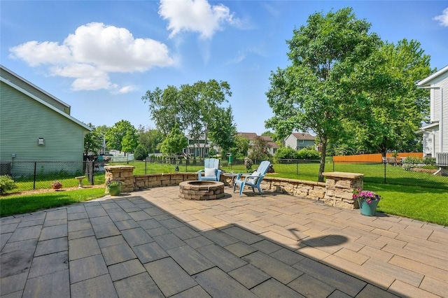 7025 Walden Rd NE, Cedar Rapids, IA 52402 - view of patio / terrace featuring an outdoor fire pit and central AC unit