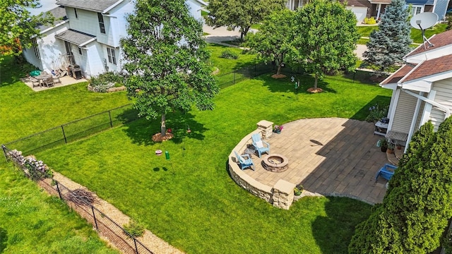7025 Walden Rd NE, Cedar Rapids, IA 52402 - view of yard with a patio area and an outdoor fire pit