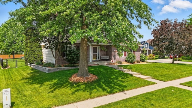7025 Walden Rd NE, Cedar Rapids, IA 52402 - view of property hidden behind natural elements with brick siding