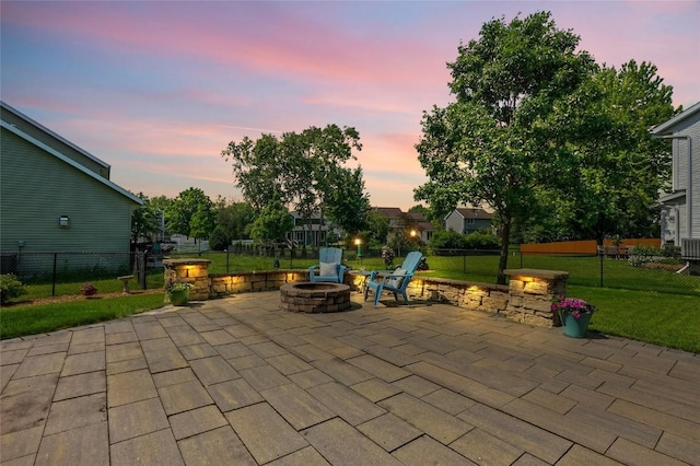 7025 Walden Rd NE, Cedar Rapids, IA 52402 - view of patio featuring an outdoor fire pit and central air condition unit