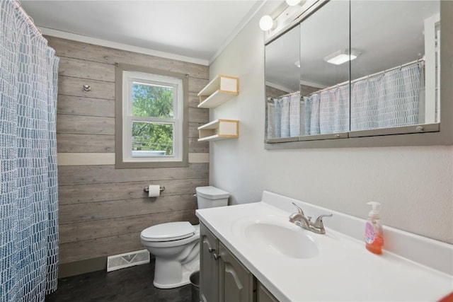 1026 Eisenhower Rd, Hiawatha, IA 52233 - bathroom featuring wood walls, vanity, toilet, crown molding, and curtained shower