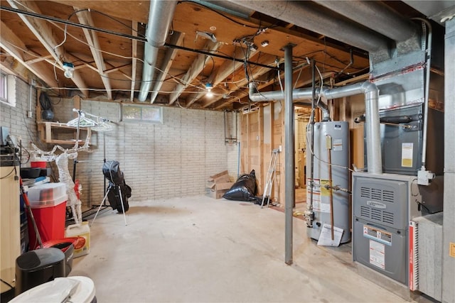 1026 Eisenhower Rd, Hiawatha, IA 52233 - below grade area featuring water heater, brick wall, and heating unit
