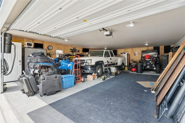 1026 Eisenhower Rd, Hiawatha, IA 52233 - garage featuring a garage door opener