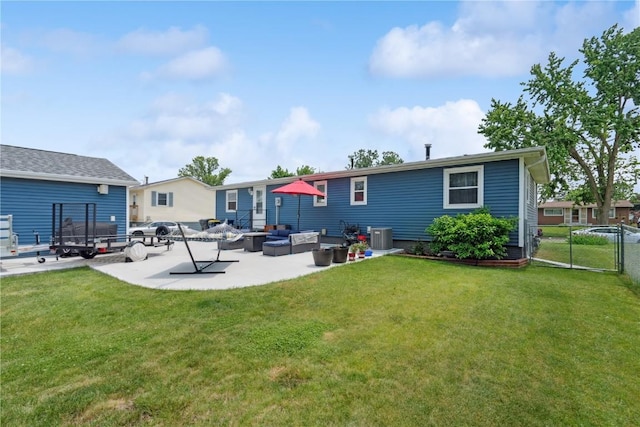 1026 Eisenhower Rd, Hiawatha, IA 52233 - rear view of property with a patio and central air condition unit