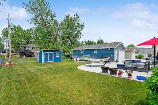 1026 Eisenhower Rd, Hiawatha, IA 52233 - view of yard featuring a patio area and a detached garage