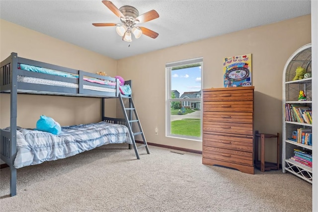 6813 Terrazzo Dr NW, Cedar Rapids, IA 52405 - carpeted bedroom featuring baseboards and a ceiling fan