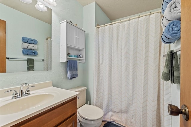 6813 Terrazzo Dr NW, Cedar Rapids, IA 52405 - bathroom featuring vanity, toilet, and a shower with curtain
