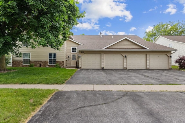4111 Blue Jay Dr NE Unit A, Cedar Rapids, IA 52402 - view of front of home featuring a front lawn
