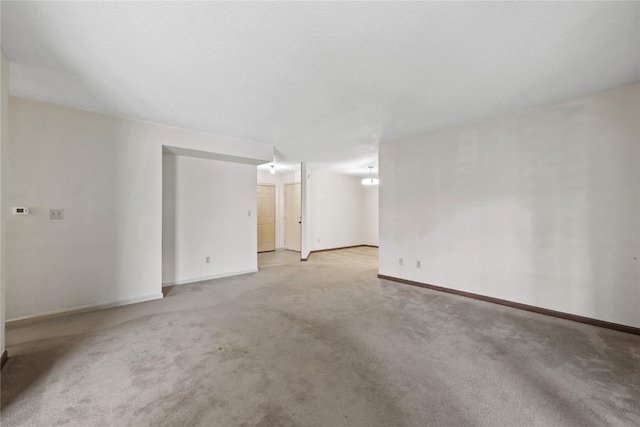 4111 Blue Jay Dr NE Unit A, Cedar Rapids, IA 52402 - unfurnished room with carpet and baseboards