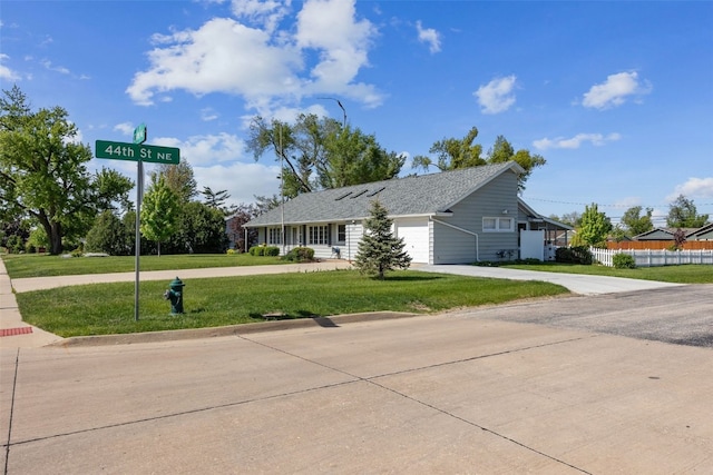 4324 C Ave NE, Cedar Rapids, IA 52402 - view of front of home featuring driveway and a garage