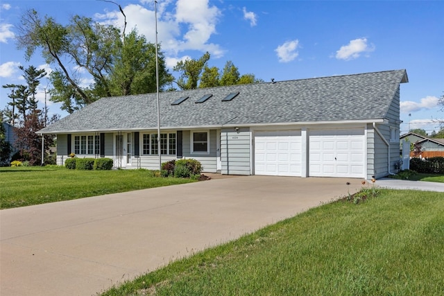 4324 C Ave NE, Cedar Rapids, IA 52402 - ranch-style home featuring an attached garage, driveway, roof with shingles, and a front yard