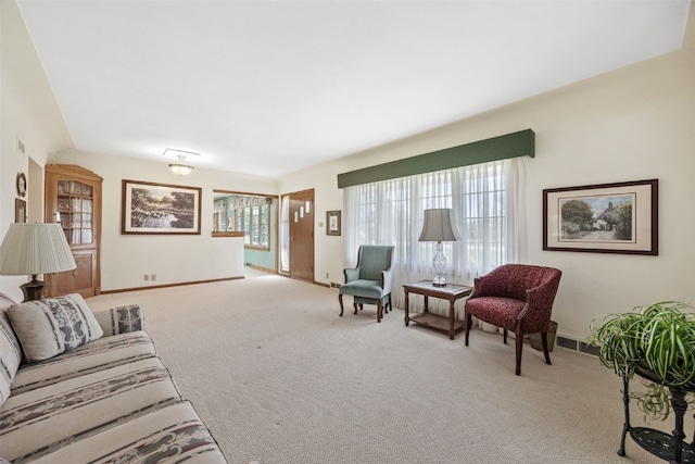 4324 C Ave NE, Cedar Rapids, IA 52402 - living area featuring carpet floors and baseboards