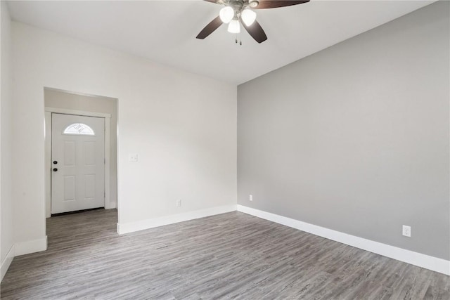 208 Northgate St, Shellsburg, IA 52332 - empty room with wood finished floors and a ceiling fan