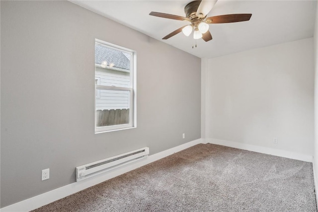208 Northgate St, Shellsburg, IA 52332 - carpeted spare room featuring a baseboard heating unit and ceiling fan