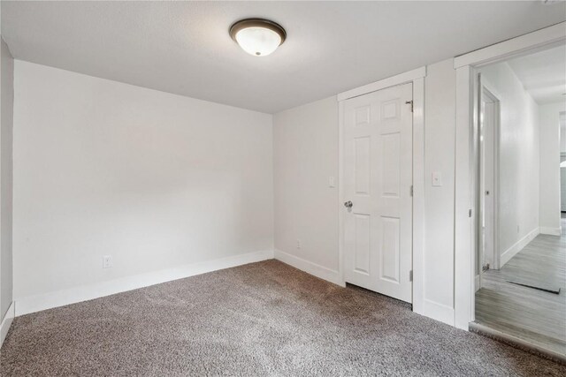 208 Northgate St, Shellsburg, IA 52332 - unfurnished bedroom featuring carpet flooring and baseboards