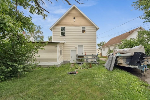 208 Northgate St, Shellsburg, IA 52332 - rear view of house with a lawn