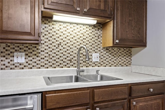 2131 1st Ave SE Unit 116, Cedar Rapids, IA 52403 - kitchen featuring a sink, dark brown cabinetry, light countertops, tasteful backsplash, and dishwasher