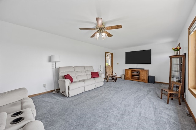1782 Baker Ave, West Branch, IA 52358 - living area with carpet flooring and ceiling fan