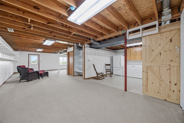 1782 Baker Ave, West Branch, IA 52358 - basement featuring freestanding refrigerator