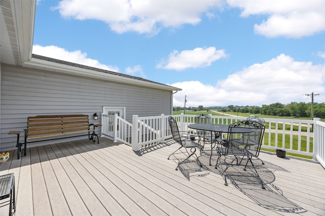 1782 Baker Ave, West Branch, IA 52358 - wooden terrace featuring outdoor dining space