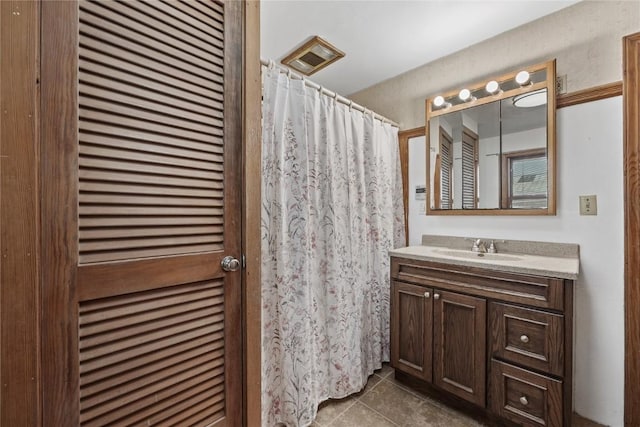 3152 66th St, Shellsburg, IA 52332 - bathroom with tile patterned floors, vanity, and curtained shower