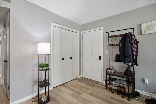 849 Kerry Ln SE Unit 49, Cedar Rapids, IA 52403 - entrance foyer featuring light wood finished floors and baseboards