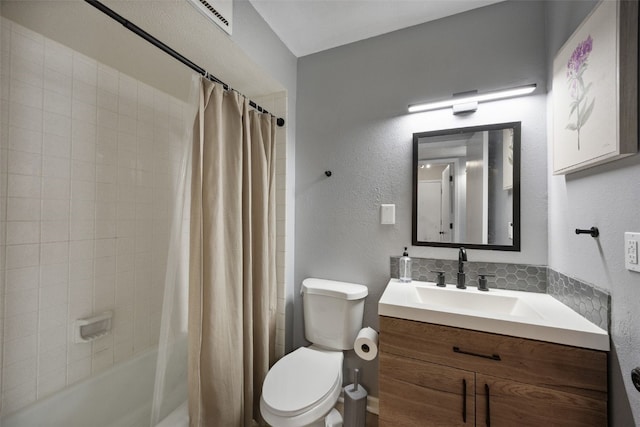 849 Kerry Ln SE Unit 49, Cedar Rapids, IA 52403 - full bathroom with toilet, vanity, shower / tub combo with curtain, and a textured wall