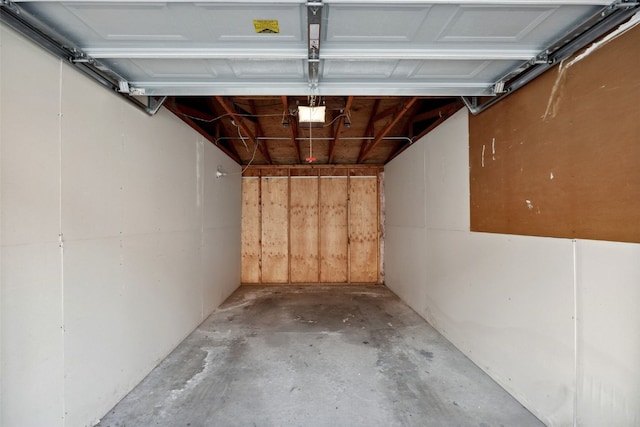 849 Kerry Ln SE Unit 49, Cedar Rapids, IA 52403 - garage featuring a garage door opener