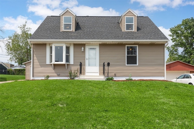 5208 Gordon Ave NW, Cedar Rapids, IA 52405 - cape cod house featuring a front yard and roof with shingles