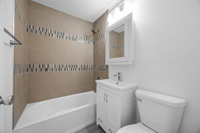 5208 Gordon Ave NW, Cedar Rapids, IA 52405 - full bathroom featuring toilet, vanity, bathing tub / shower combination, and wood finished floors