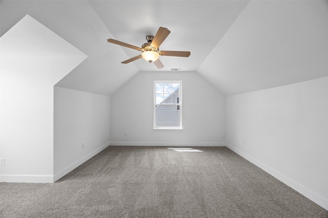 5208 Gordon Ave NW, Cedar Rapids, IA 52405 - bonus room with carpet, baseboards, lofted ceiling, and ceiling fan