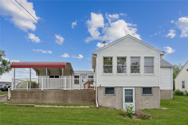 2241 Williams Blvd SW, Cedar Rapids, IA 52404 - back of house with a yard and a detached carport