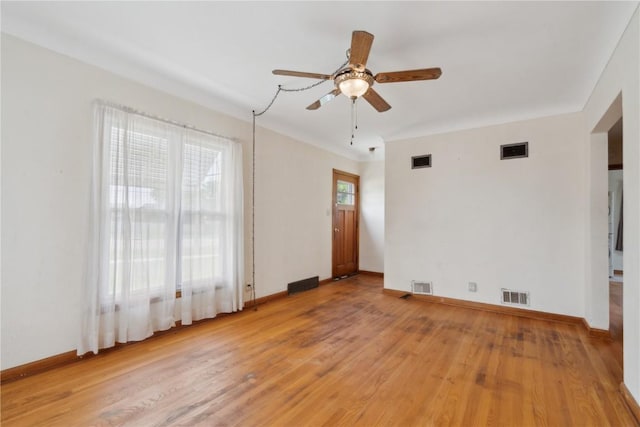 2241 Williams Blvd SW, Cedar Rapids, IA 52404 - empty room with a ceiling fan, light wood-type flooring, and baseboards