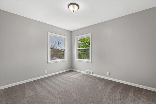2820 12th Ave SW, Cedar Rapids, IA 52404 - carpeted spare room with baseboards