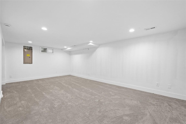 2820 12th Ave SW, Cedar Rapids, IA 52404 - finished basement with recessed lighting, carpet, electric panel, and baseboards