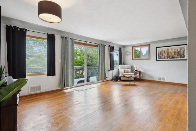 331 Lake View Dr NE, Solon, IA 52333 - living area featuring wood finished floors and baseboards