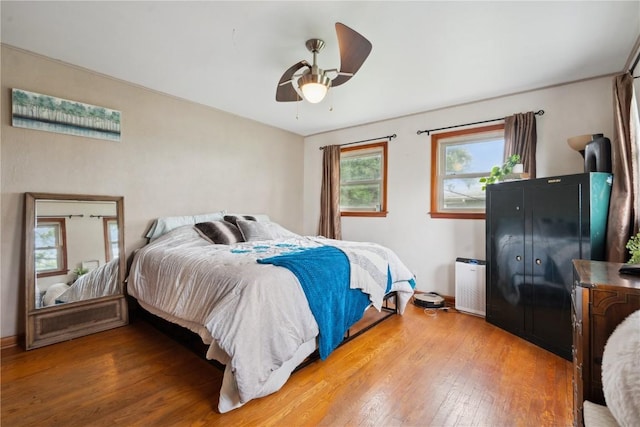 331 Lake View Dr NE, Solon, IA 52333 - bedroom with wood finished floors and a ceiling fan