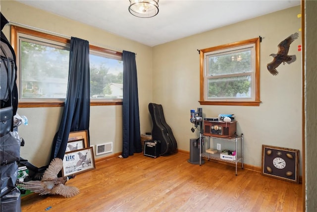 331 Lake View Dr NE, Solon, IA 52333 - miscellaneous room featuring wood finished floors and baseboards
